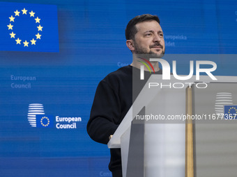 President of Ukraine Volodymyr Zelenskyy addresses a press conference during his visit at the European Council Summit, the EU leaders meetin...