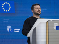 President of Ukraine Volodymyr Zelenskyy addresses a press conference during his visit at the European Council Summit, the EU leaders meetin...