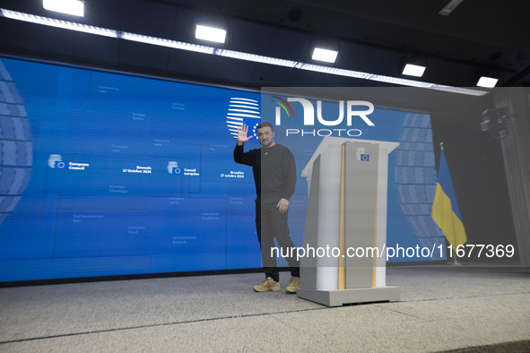 President of Ukraine Volodymyr Zelenskyy addresses a press conference during his visit at the European Council Summit, the EU leaders meetin...