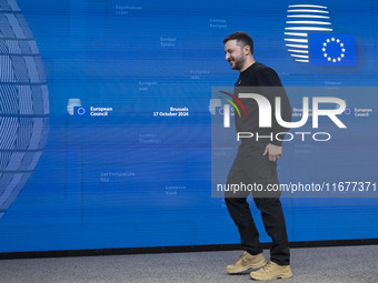 President of Ukraine Volodymyr Zelenskyy addresses a press conference during his visit at the European Council Summit, the EU leaders meetin...