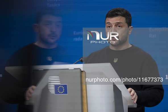 President of Ukraine Volodymyr Zelenskyy addresses a press conference during his visit at the European Council Summit, the EU leaders meetin...