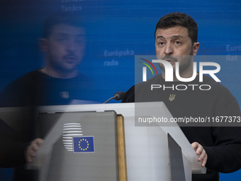 President of Ukraine Volodymyr Zelenskyy addresses a press conference during his visit at the European Council Summit, the EU leaders meetin...