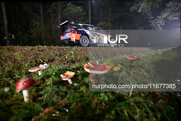 Driver Ott Tanak and co-driver Martin Jarveoja of the Hyundai Shell Mobis World Rally Team, in a Hyundai i20 N Rally1 Hybrid, face the secon...