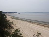 A historic drought occurs on the Negro River, seen from the Ponta Negra neighborhood in Manaus, Amazonas, Brazil, on October 13, 2024. (