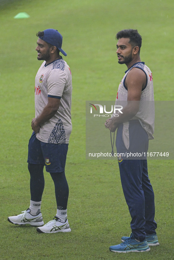 Bangladeshi cricketers Zakir Hasan (L) and Mehidy Hasan Miraz attend a practice session at the Sher-e-Bangla National Cricket Stadium in Dha...