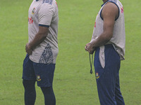 Bangladeshi cricketers Zakir Hasan (L) and Mehidy Hasan Miraz attend a practice session at the Sher-e-Bangla National Cricket Stadium in Dha...