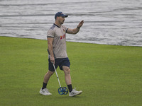 Bangladeshi cricket team Physiotherapist Nathan Kiely participates in a practice session at the Sher-e-Bangla National Cricket Stadium in Dh...