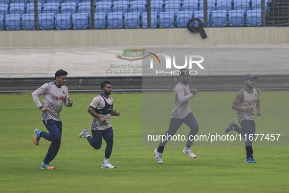 Bangladeshi cricketers attend a practice session at the Sher-e-Bangla National Cricket Stadium in Dhaka, Bangladesh, on October 18, 2024, ah...