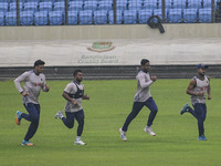 Bangladeshi cricketers attend a practice session at the Sher-e-Bangla National Cricket Stadium in Dhaka, Bangladesh, on October 18, 2024, ah...