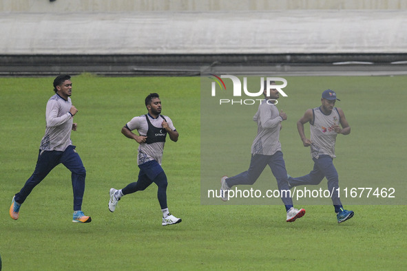 Bangladeshi cricketers attend a practice session at the Sher-e-Bangla National Cricket Stadium in Dhaka, Bangladesh, on October 18, 2024, ah...