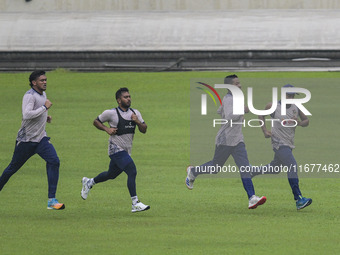 Bangladeshi cricketers attend a practice session at the Sher-e-Bangla National Cricket Stadium in Dhaka, Bangladesh, on October 18, 2024, ah...