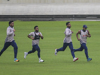 Bangladeshi cricketers attend a practice session at the Sher-e-Bangla National Cricket Stadium in Dhaka, Bangladesh, on October 18, 2024, ah...