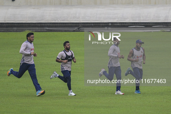 Bangladeshi cricketers attend a practice session at the Sher-e-Bangla National Cricket Stadium in Dhaka, Bangladesh, on October 18, 2024, ah...