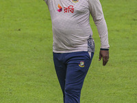 Bangladeshi cricket team head coach Phil Simmons participates in a practice session at the Sher-e-Bangla National Cricket Stadium in Dhaka,...