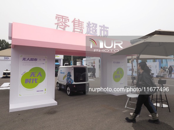 The audience visits the ''Autonomous Driving Sales Truck'' at the 2024 World Intelligent Connected Vehicle Conference in Beijing, China, on...