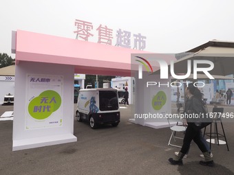 The audience visits the ''Autonomous Driving Sales Truck'' at the 2024 World Intelligent Connected Vehicle Conference in Beijing, China, on...