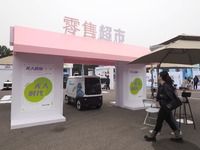 The audience visits the ''Autonomous Driving Sales Truck'' at the 2024 World Intelligent Connected Vehicle Conference in Beijing, China, on...