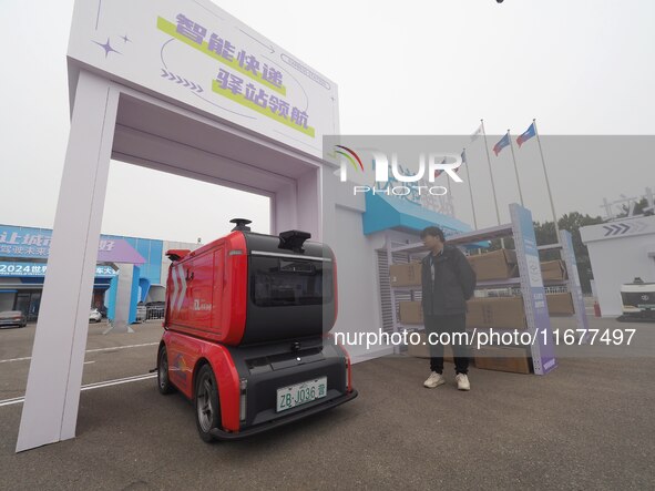 The audience visits the ''JD Autonomous Delivery Vehicle'' at the 2024 World Intelligent Connected Vehicle Conference in Beijing, China, on...