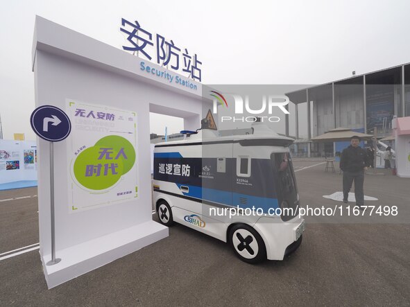 The audience visits the ''Autonomous Patrol and Defense Vehicle'' at the 2024 World Intelligent Connected Vehicle Conference in Beijing, Chi...