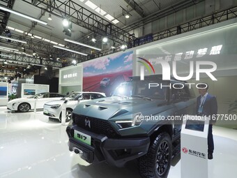 The audience visits the Dongfeng Motor booth at the 2024 World Intelligent Connected Vehicle Conference in Beijing, China, on October 18, 20...