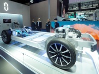 The audience visits the chassis structure model of new energy vehicles at the 2024 World Intelligent Connected Vehicle Conference in Beijing...