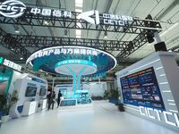 The audience visits the China Information Communication Technologies booth at the 2024 World Intelligent Connected Vehicle Conference in Bei...