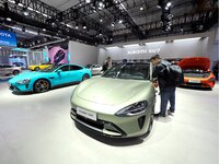 The audience visits the Xiaomi car booth at the 2024 World Intelligent Connected Vehicle Conference in Beijing, China, on October 18, 2024....