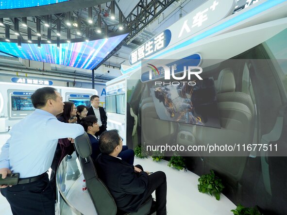 Viewers experience the ''Automotive Cloud Game'' at the 2024 World Intelligent Connected Vehicle Conference in Beijing, China, on October 18...