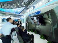 Viewers experience the ''Automotive Cloud Game'' at the 2024 World Intelligent Connected Vehicle Conference in Beijing, China, on October 18...