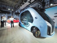 The audience visits the ''Hongqi Intelligent Bus'' at the 2024 World Intelligent Connected Vehicle Conference in Beijing, China, on October...