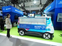 The audience visits the ''unmanned retail ice cream truck'' at the 2024 World Intelligent Connected Vehicle Conference in Beijing, China, on...