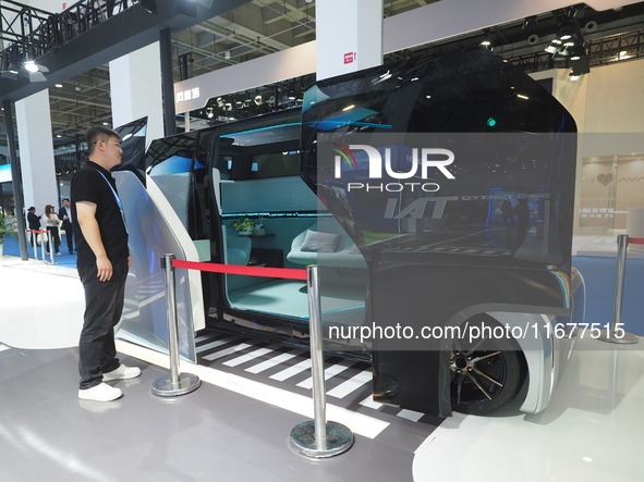 The audience visits the ''Multi-purpose Intelligent Autonomous Driving Concept Vehicle'' at the 2024 World Intelligent Connected Vehicle Con...