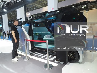 The audience visits the ''Multi-purpose Intelligent Autonomous Driving Concept Vehicle'' at the 2024 World Intelligent Connected Vehicle Con...