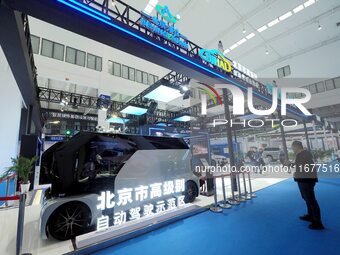 The audience visits the Yizhuang booth in Beijing, China, on October 18, 2024, at the 2024 World Intelligent Connected Vehicle Conference. (