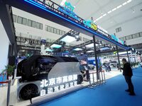 The audience visits the Yizhuang booth in Beijing, China, on October 18, 2024, at the 2024 World Intelligent Connected Vehicle Conference. (