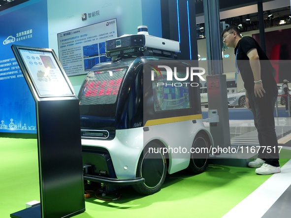 The audience visits the ''Autonomous Driving AI Inspection Vehicle'' at the 2024 World Intelligent Connected Vehicle Conference in Beijing,...