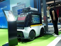 The audience visits the ''Autonomous Driving AI Inspection Vehicle'' at the 2024 World Intelligent Connected Vehicle Conference in Beijing,...