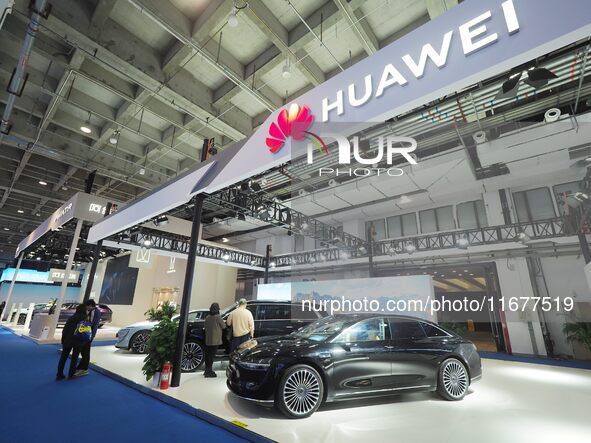 The audience visits the Huawei Automotive booth at the 2024 World Intelligent Connected Vehicle Conference in Beijing, China, on October 18,...