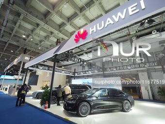 The audience visits the Huawei Automotive booth at the 2024 World Intelligent Connected Vehicle Conference in Beijing, China, on October 18,...