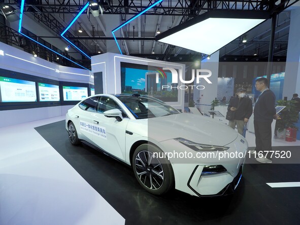 The audience visits the Integrated Smart Passenger Vehicle at the 2024 World Intelligent Connected Vehicle Conference in Beijing, China, on...