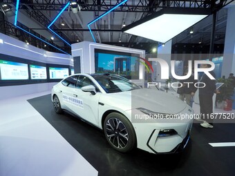 The audience visits the Integrated Smart Passenger Vehicle at the 2024 World Intelligent Connected Vehicle Conference in Beijing, China, on...