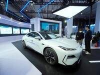 The audience visits the Integrated Smart Passenger Vehicle at the 2024 World Intelligent Connected Vehicle Conference in Beijing, China, on...