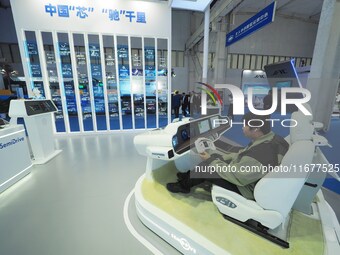 Viewers experience the intelligent cockpit at the 2024 World Intelligent Connected Vehicle Conference in Beijing, China, on October 18, 2024...