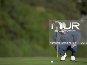 Thorbjorn Olesen of Denmark studies his shot on the 10th green during the Estrella Damm N.A. Andalucia Masters 2024 at Real Club de Golf Sot...