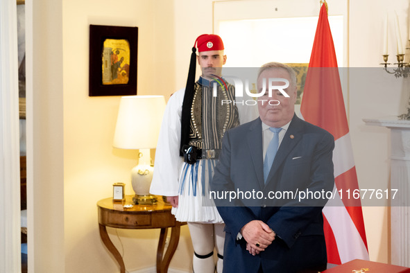 Grand Master and head of the Sovereign Military Order of Malta, Fra' John Timothy Dunlap, and Greek President Katerina Sakellaropoulou excha...