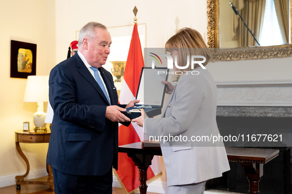 Grand Master and head of the Sovereign Military Order of Malta, Fra' John Timothy Dunlap (L), and Greek President Katerina Sakellaropoulou (...