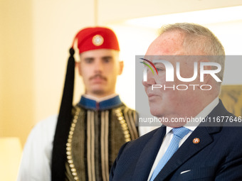 Grand Master and head of the Sovereign Military Order of Malta, Fra' John Timothy Dunlap, and Greek President Katerina Sakellaropoulou excha...