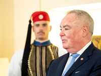 Grand Master and head of the Sovereign Military Order of Malta, Fra' John Timothy Dunlap, and Greek President Katerina Sakellaropoulou excha...