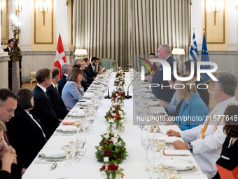 Grand Master and head of the Sovereign Military Order of Malta, Fra' John Timothy Dunlap, and the President of Greece, Katerina Sakellaropou...