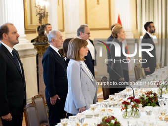 Grand Master and head of the Sovereign Military Order of Malta, Fra' John Timothy Dunlap (not pictured), and the President of Greece, Kateri...